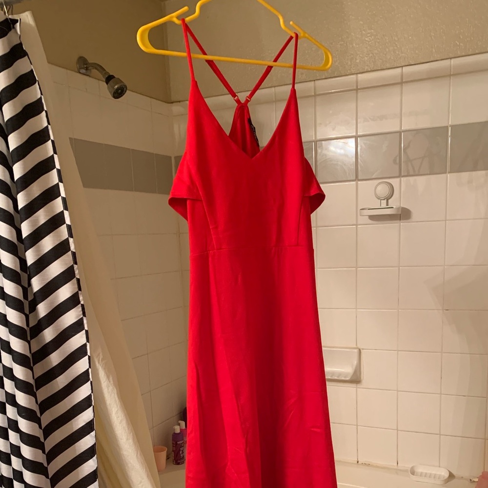 Brand new red gown. Full length. Off the shoulder sleeves, strap on Shoulders.